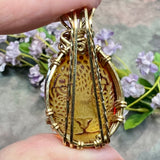 One of a Kind, Carved Leopard in Cherry Amber Pendant  in 14KGF