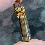 Wire Wrapped Dicroic Glass and Garnet Pendant in 14 K GF Wire